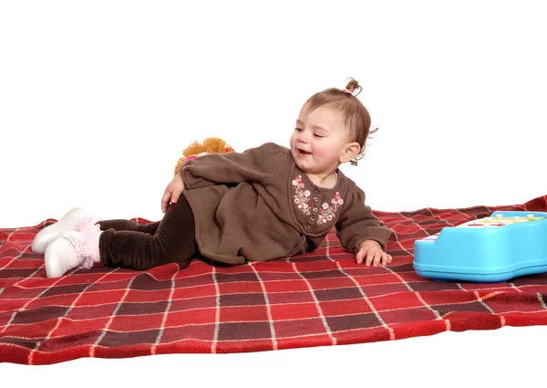 Smiling girl lying on floor. — Stock Photo, Image