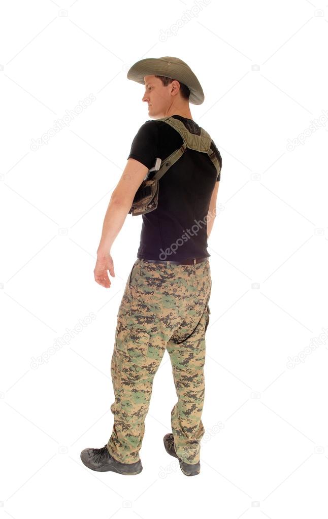 Relaxed soldier standing.