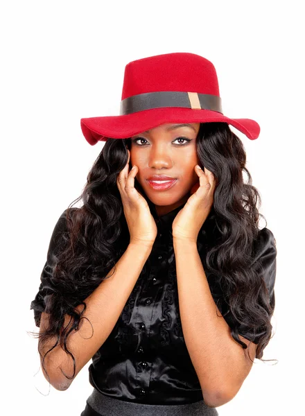 Black woman with red hat. — Stock Photo, Image