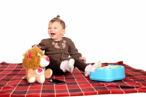 Bébé s'amuser avec ses jouets . — Photo