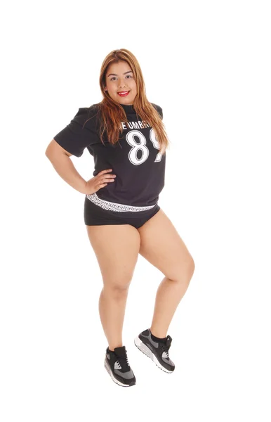 Dívka stojící v černé sportovní oblečení. — Stock fotografie