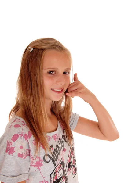 Menina gesticulando um telefonema . — Fotografia de Stock