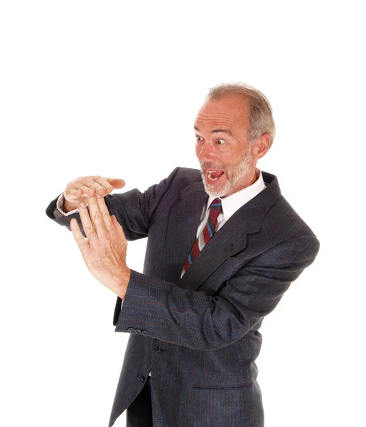 Happy businessman giving sign with hands. — Stock Photo, Image