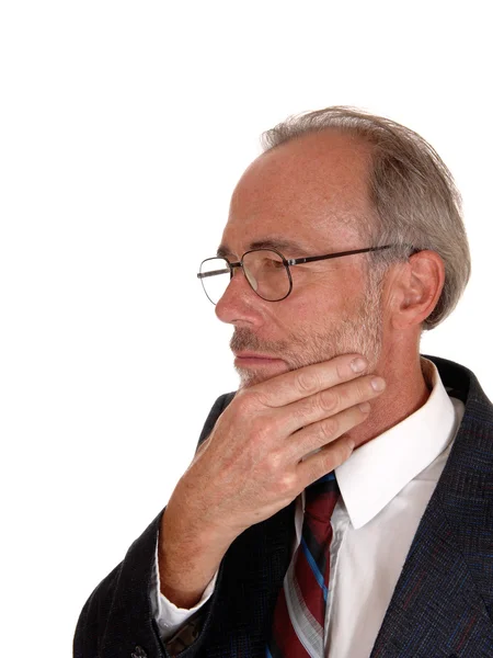 Middle age man with hand on chin. — Stock Photo, Image