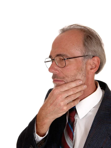 Hombre de mediana edad con la mano en la barbilla . — Foto de Stock