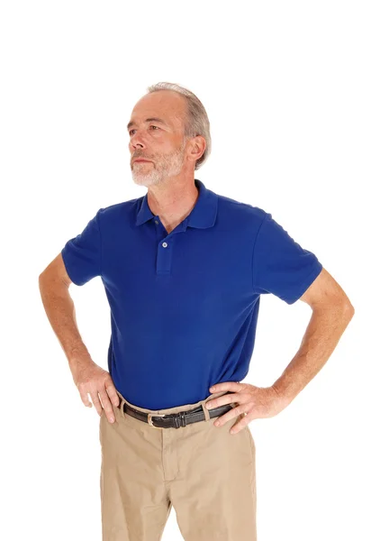 Handsome middle age man in blue t-shirt. — Stock Photo, Image