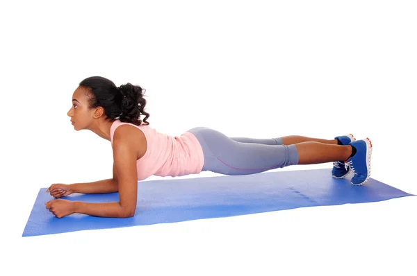 Beautiful african american woman exercising. — Stock Photo, Image