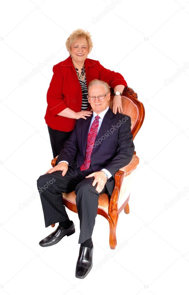 A mature couple in a formal image.