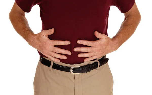 Hombre sosteniendo su estómago para el dolor . — Foto de Stock