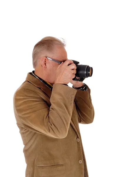 Middle age man taking pictures. — Stock Photo, Image