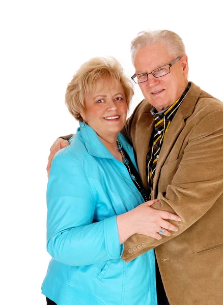 Senior couple standing and hugging. — Stock Photo, Image