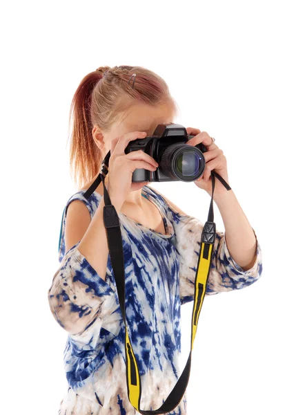 Tiener meisje staking van foto 's. — Stockfoto