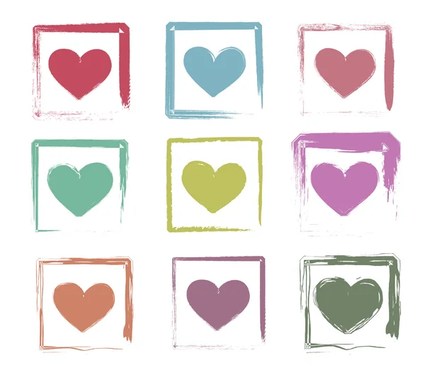 Set of grungy heart icons — Stock Vector