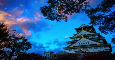 Osaka castal ncie renk ile günbatımı anda zaman atlamalı
