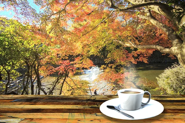 Vintage cup on wooden table — Stock Photo, Image