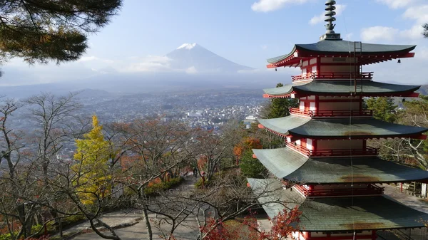 Image of the sacred mountain of Fuji in the background of blue s — Stock Photo, Image