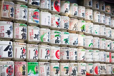 Traditional donated sake barrels at Meiji Shrine in Shibuya, Tok clipart