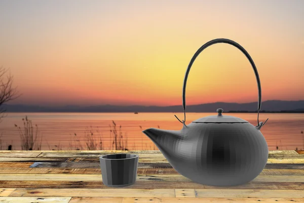 La teiera e la tazza con un bel sfondo — Foto Stock