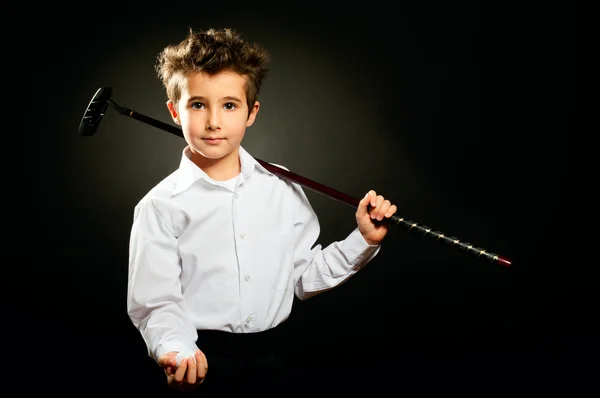 Niño pequeño con club de golf retrato de estudio de bajo perfil Fotos de stock libres de derechos