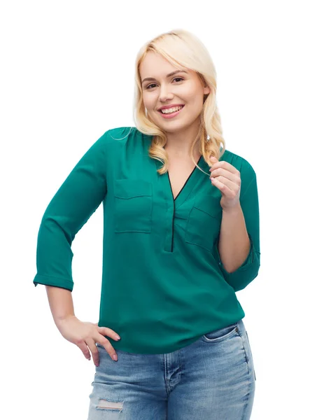 Smiling young woman in shirt and jeans — Stock Photo, Image