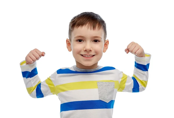 Szczęśliwy, uśmiechnięty chłopczyk z podniesiona ręka — Zdjęcie stockowe