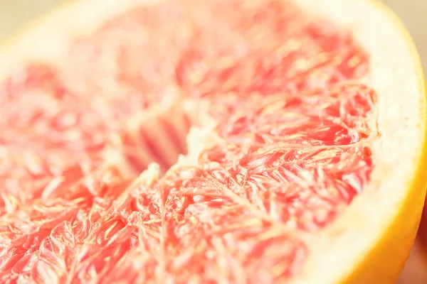 Close up of fresh juicy grapefruit slice — Stock Photo, Image