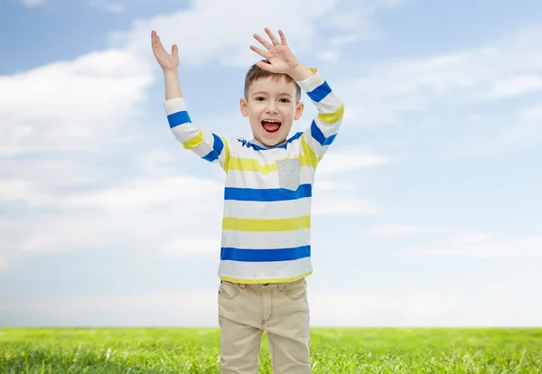 Felice ragazzino che saluta le mani — Foto Stock