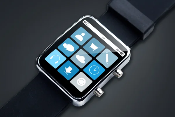 Close up of smart watch with menu icons on screen — Stock Photo, Image