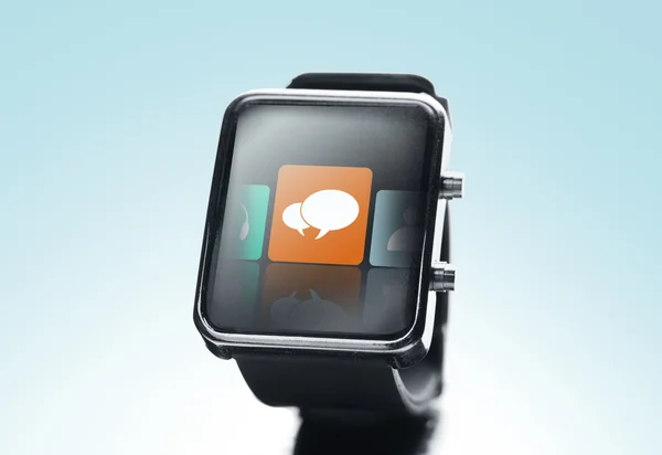 Close up of black smart watch with messenger icon — Stock Photo, Image