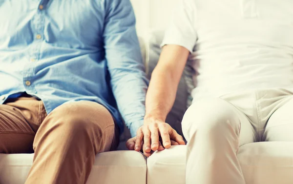 Close up of happy male gay couple holding hands — Stock Photo, Image