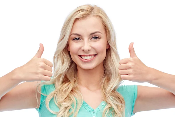 Lycklig kvinna eller tonårig flicka visar tummen upp — Stockfoto