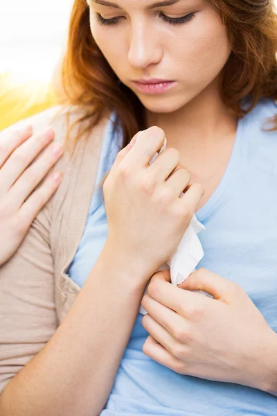 Close up of crying teenage girl and friend hand — Stock Photo, Image