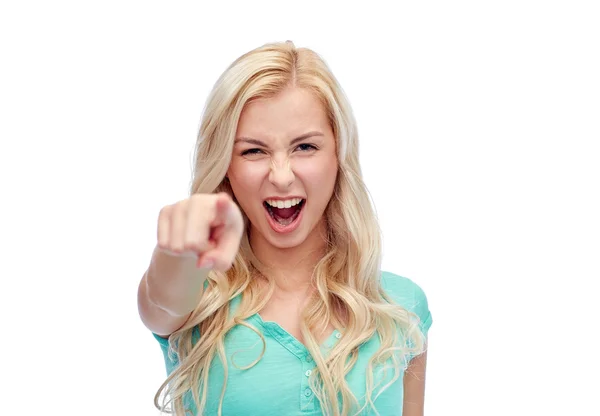 Happy young woman pointing finger to you — Stock Photo, Image