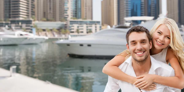 Happy couple having fun over dubai city harbour — Stock Photo, Image