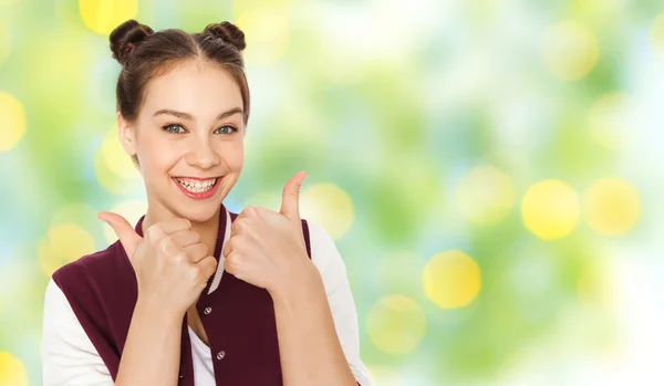 Menina adolescente feliz mostrando polegares para cima — Fotografia de Stock