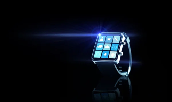 Close up of black smartwatch with app icons — Stock Photo, Image