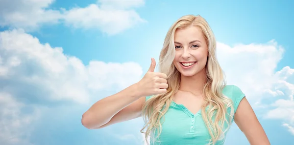 Happy woman or teenage girl showing thumbs up — Stock Photo, Image