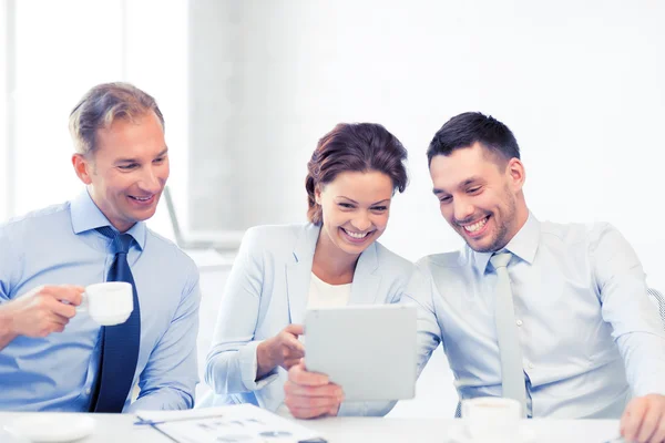 Business team having fun with tablet pc in office — Stock Photo, Image