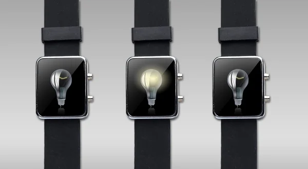 Close up of smart watch with light bulb on screen — Stock Photo, Image