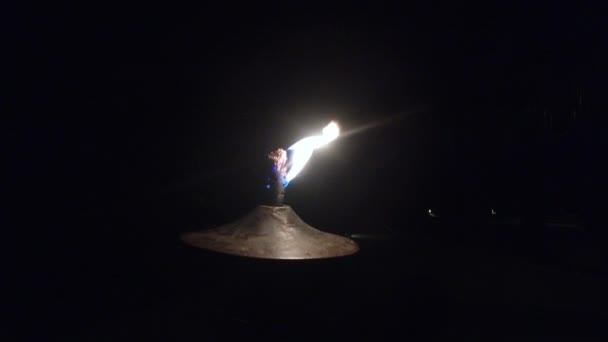 Oil lamp or torch flame burning on beach — Stock Video