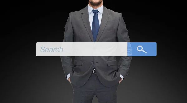 Close up of businessman with internet search bar — Stock fotografie