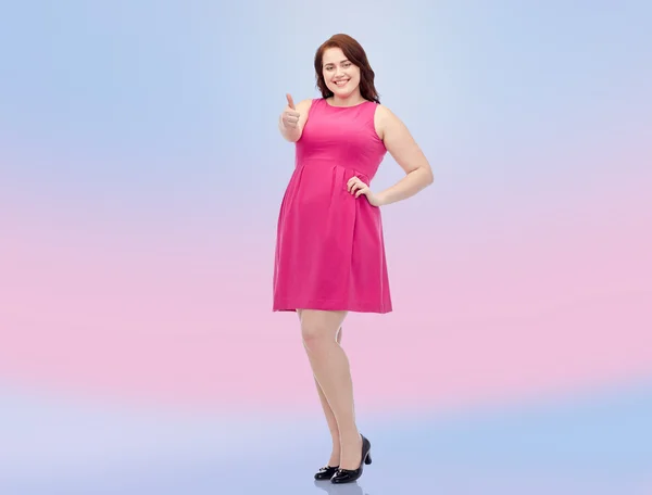 Happy young plus size woman showing thumbs up — Stock Photo, Image