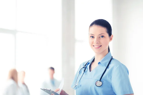 Female doctor or nurse in hospital — Stock Photo, Image