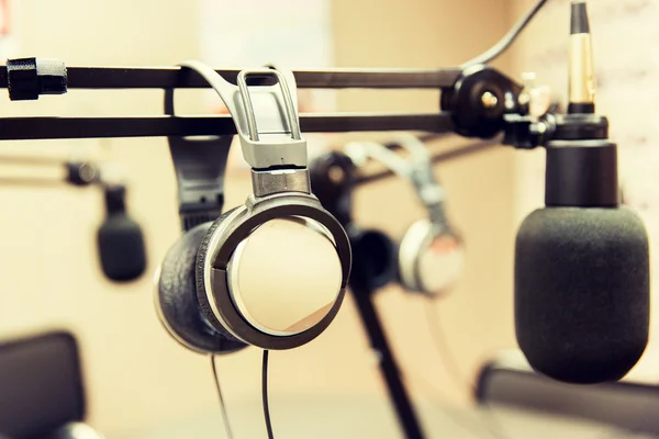 Headphones at recording studio or radio station — Stock Photo, Image