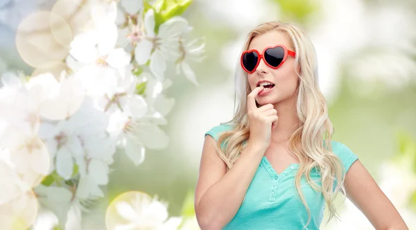 Happy young blonde woman or teenager in sunglasses — Stock Photo, Image