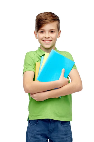 Glücklicher Studentenjunge mit Ordnern und Notizbüchern — Stockfoto