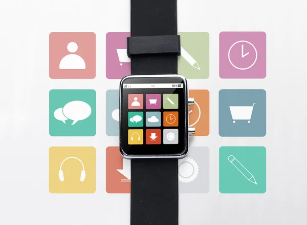 Close up of smart watch with menu icons on screen — Stock Photo, Image