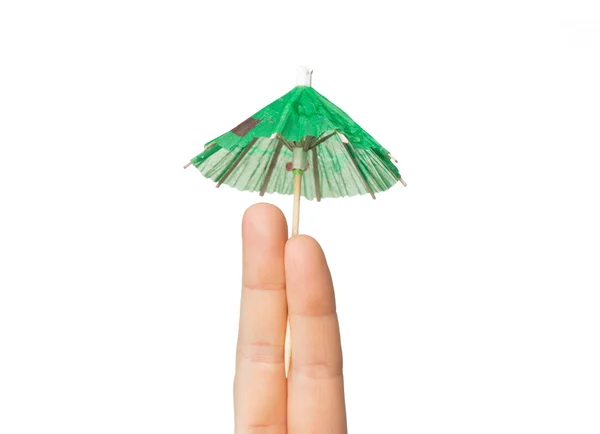 Primer plano de dos dedos con paraguas de cóctel —  Fotos de Stock