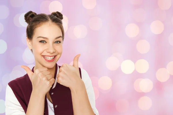 Feliz bonita adolescente mostrando los pulgares hacia arriba —  Fotos de Stock