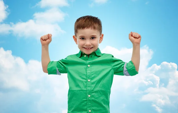 Feliz sorrindo menino com a mão levantada — Fotografia de Stock